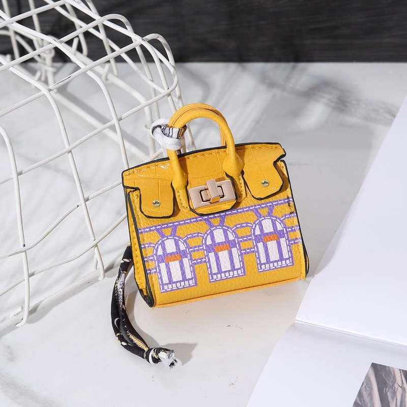 Hot Selling Luxury PU Leather Coin Purses Keychain Unisex Mini Wallet Bag with Carton Pattern for Car Key Chain Wholesale – Hand Bag and Shoulder Bag price